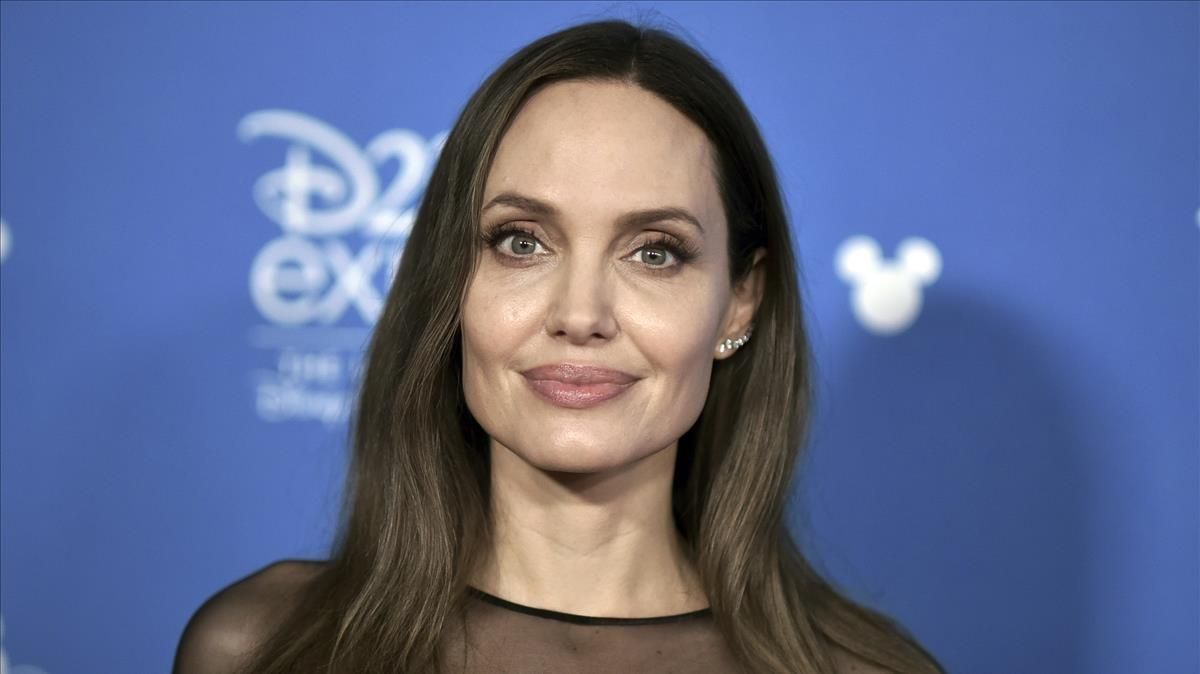 Angelina Jolie attends the Go Behind the Scenes with the Walt Disney Studios press line at the 2019 D23 Expo Saturday Aug 24 2019 in Anaheim Calif (Photo by Richard Shotwell Invision AP) Angelina Jolie attends the Go Behind the Scenes with the Walt Disney Studios press line at the 2019 D23 Expo Saturday Aug 24 2019 in Anaheim Calif (Photo by Richard Shotwell Invision AP)