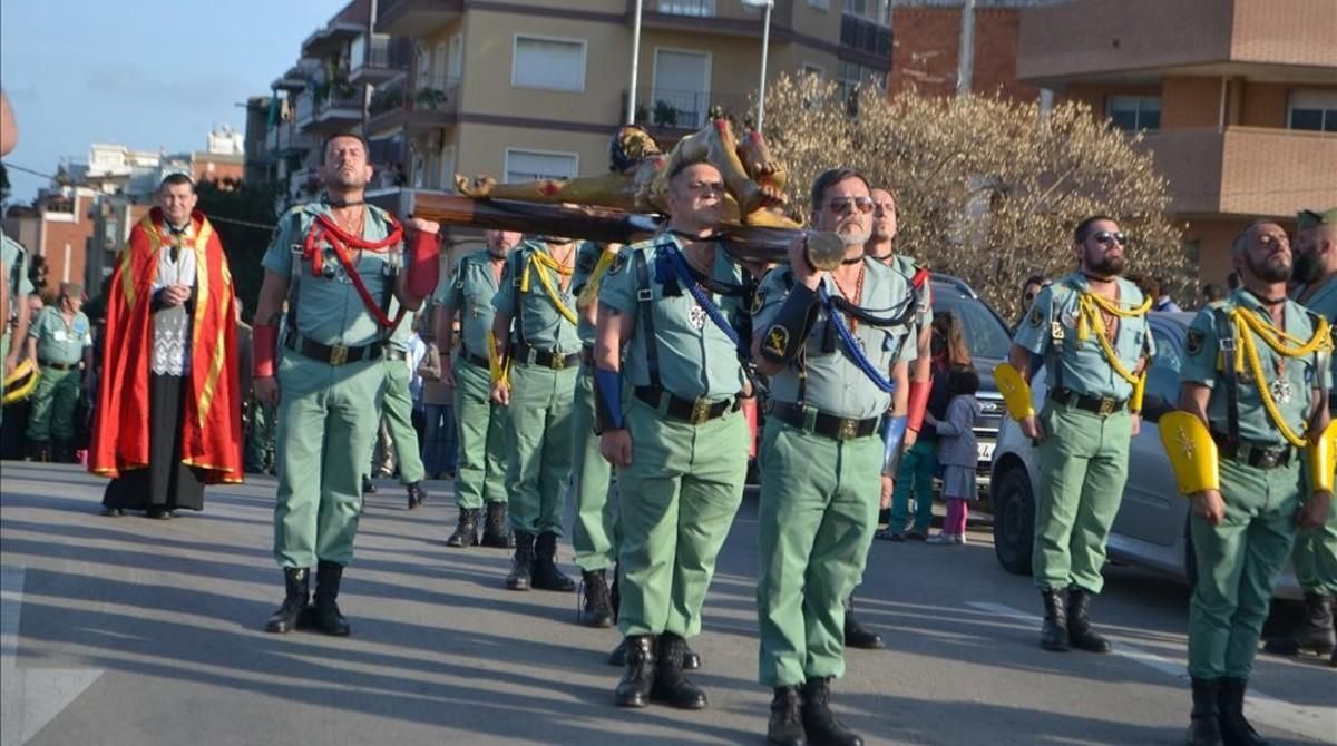 Exlegionarios llevan a un Cristo por las calles de L’Hospitalet el 2015. Exlegionarios llevan a un Cristo por las calles de L’Hospitalet el 2015.