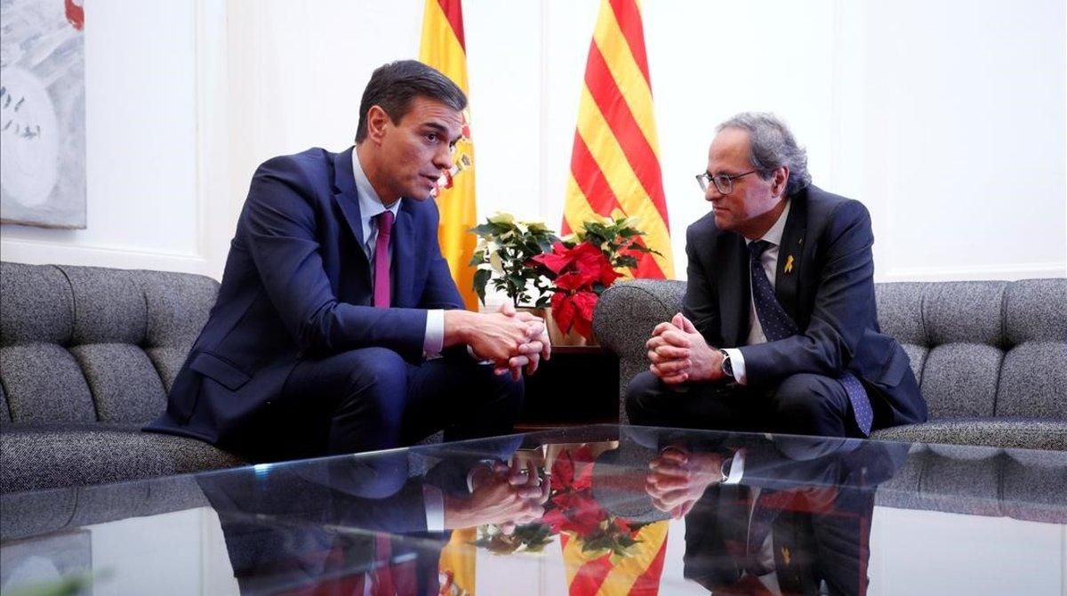 Pedro Sánchez y Quim Torra en el encuentro en Pedralbes (Barcelona), el 20 de diciembre del 2018. Pedro Sánchez y Quim Torra en el encuentro en Pedralbes (Barcelona), el 20 de diciembre del 2018.