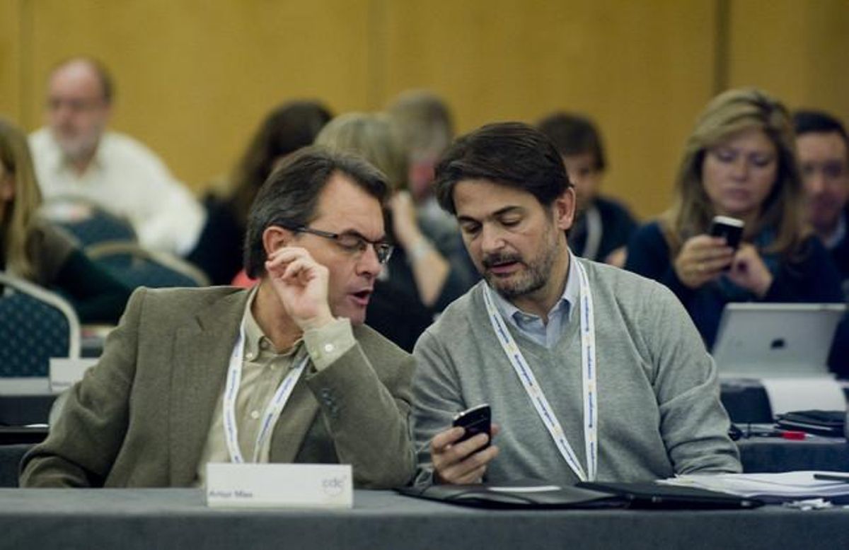 Artur Mas y Oriol Pujol, durante la reunión del Consell Nacional de CDC. Artur Mas y Oriol Pujol, durante la reunión del Consell Nacional de CDC.