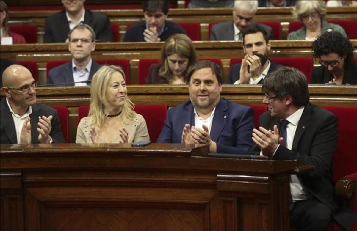 Raül Romeva, Neus Munté, Oriol Junqueras y Carles Puigdemont en el Parlament.