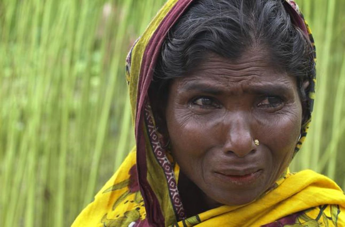 Una mujer bangladesí, emocionada tras saber del histórico acuerdo entre la Índia y Bangladés. Una mujer bangladesí, emocionada tras saber del histórico acuerdo entre la Índia y Bangladés.