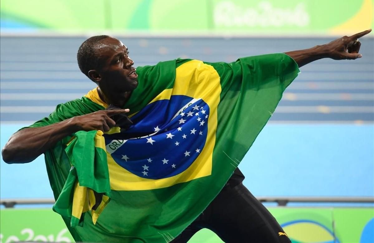 Usain Bolt, con la bandera de Jamaica, en Río. Usain Bolt, con la bandera de Jamaica, en Río.