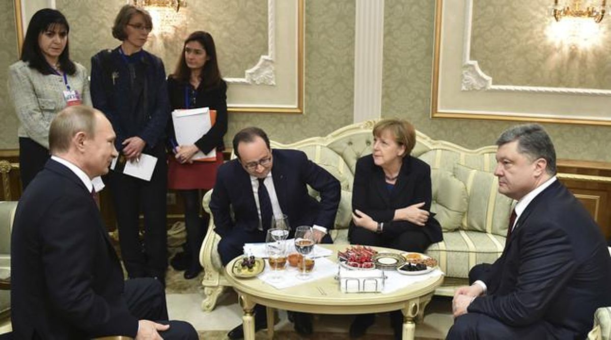 Vladimir Putin, François Hollande, Angela Merkel y Petró Poroshenko, durante las negociaciones en Minsk. Vladimir Putin, François Hollande, Angela Merkel y Petró Poroshenko, durante las negociaciones en Minsk.