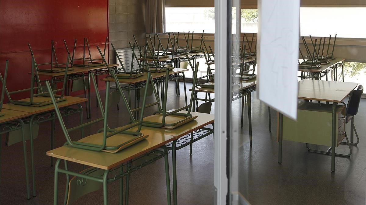 Un aula vacía de un instituto por culpa del coronavirus. Un aula vacía de un instituto por culpa del coronavirus.