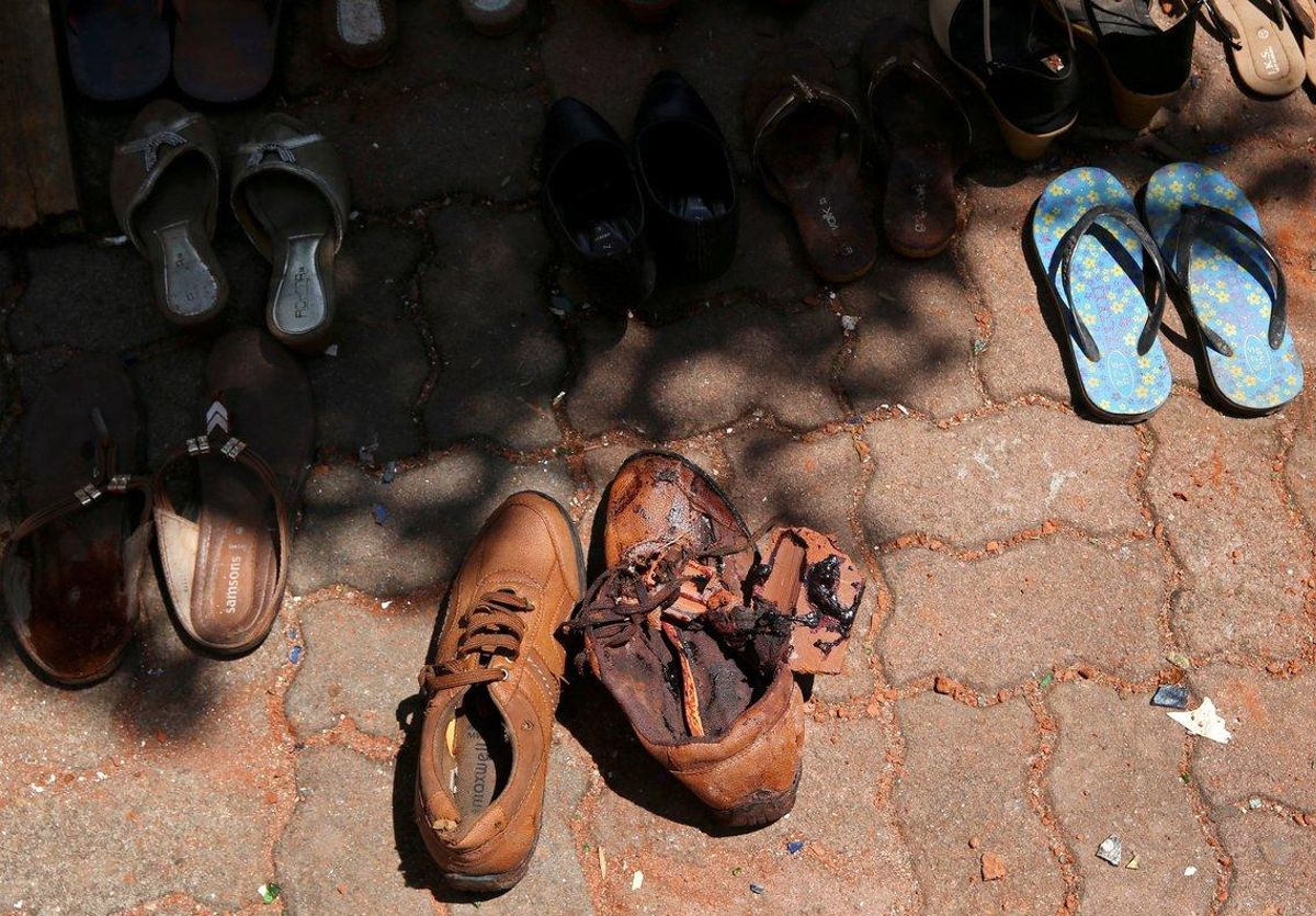 Blood is seen on a pair of shoes at St Sebastian Catholic Church after bomb blasts ripped through churches and luxury hotels on Easter in Negambo Sri Lanka April 22 2019 REUTERS Athit Perawongmetha TEMPLATE OUT Blood is seen on a pair of shoes at St Sebastian Catholic Church after bomb blasts ripped through churches and luxury hotels on Easter in Negambo Sri Lanka April 22 2019 REUTERS Athit Perawongmetha TEMPLATE OUT