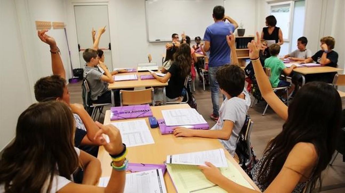 Clase de primero de ESO en el instituto Viladomat, en el Eixample de Barcelona. Clase de primero de ESO en el instituto Viladomat, en el Eixample de Barcelona.