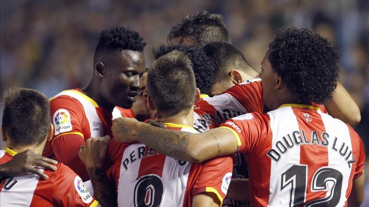 Los jugadores del Girona celebran el gol de Juanpe, que suponía el empate a 3 en Balaídos. Los jugadores del Girona celebran el gol de Juanpe, que suponía el empate a 3 en Balaídos.