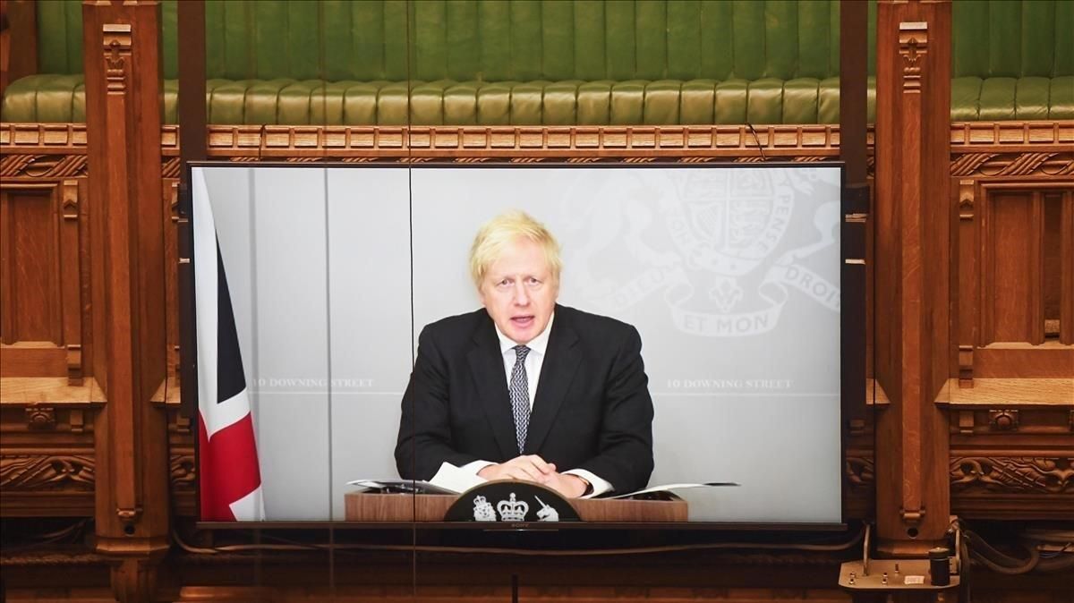 Johnson en el momento de presentar el plan de su Gobierno para combatir el coronavirus este invierno en el Reino Unido. Johnson en el momento de presentar el plan de su Gobierno para combatir el coronavirus este invierno en el Reino Unido.
