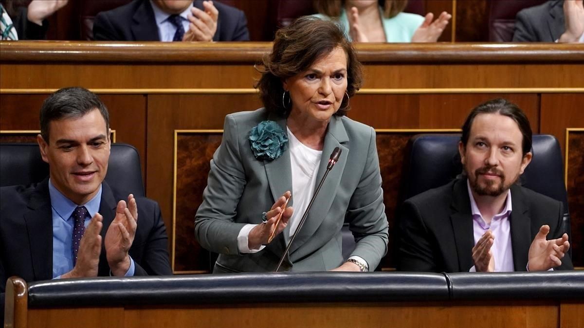 El presidente del Gobierno, Pedro Sánchez, la vicepresidenta Carmen Calvo y el vicepresidente Pablo Iglesias, en el Congreso. El presidente del Gobierno, Pedro Sánchez, la vicepresidenta Carmen Calvo y el vicepresidente Pablo Iglesias, en el Congreso.