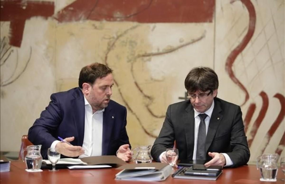 Oriol Junqueras y Carles Puigdemont. Oriol Junqueras y Carles Puigdemont.