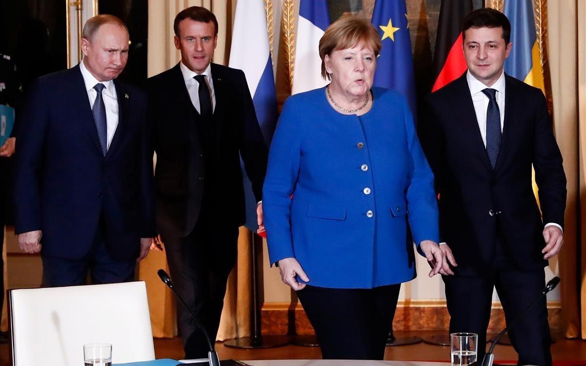 Putin, Merkel, Macron y Zelensky, antes de empezar la reunión en París.