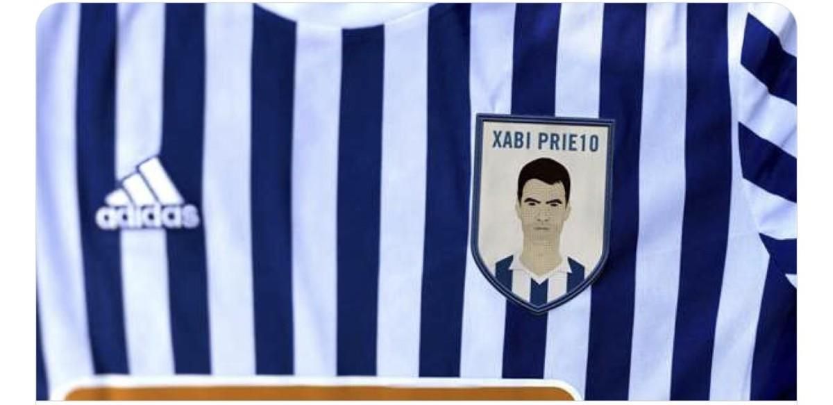 Imagen de Xabi Prieto en el escudo que lucirá la Real el sábado frente al Leganés. Imagen de Xabi Prieto en el escudo que lucirá la Real el sábado frente al Leganés.
