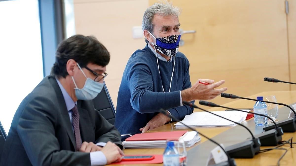 El ministro Illa y Fernando Simón, durante la reunión que han mantenido con los frepresentates de la Comunidad de Madrid. El ministro Illa y Fernando Simón, durante la reunión que han mantenido con los frepresentates de la Comunidad de Madrid.