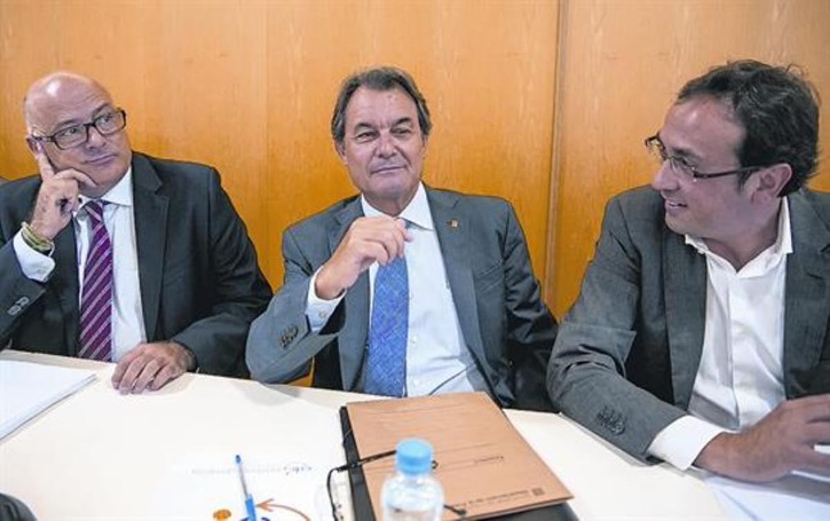 Lluís Corominas, Artur Mas y Josep Rull, en una reunión de la ejecutiva de Convergència.