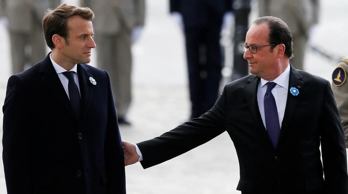 François Hollande y Emmanuel Macron durante una ceremonia por el Día de la Victoria. François Hollande y Emmanuel Macron durante una ceremonia por el Día de la Victoria.