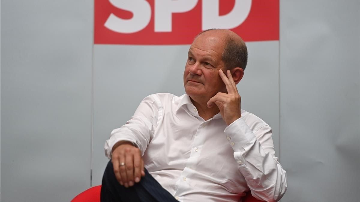 El candidato del SPD a la cancillería alemana, Olaf Scholz, durante un acto con ciudadanos este jueves. El candidato del SPD a la cancillería alemana, Olaf Scholz, durante un acto con ciudadanos este jueves.