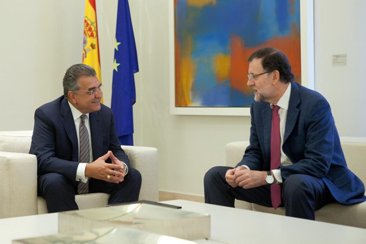 Francisco Javier García Sanz (Volkswagen) y Mariano Rajoy en la Moncloa.