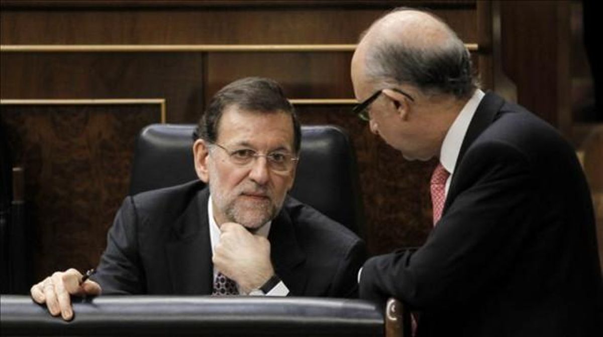 Mariano Rajoy y Cristóbal Montoro, en el Congreso. Mariano Rajoy y Cristóbal Montoro, en el Congreso.