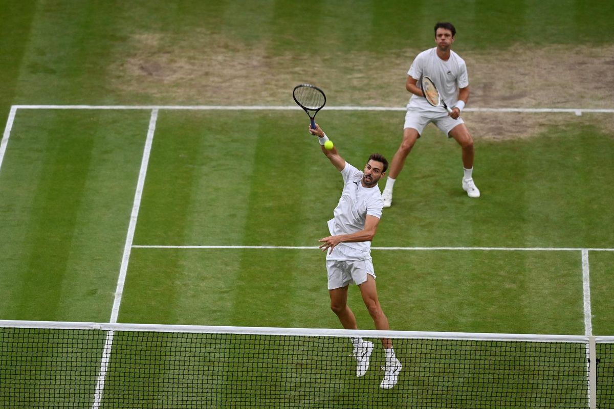 Granollers remata un punto en la final de Wimbledon. Granollers remata un punto en la final de Wimbledon.