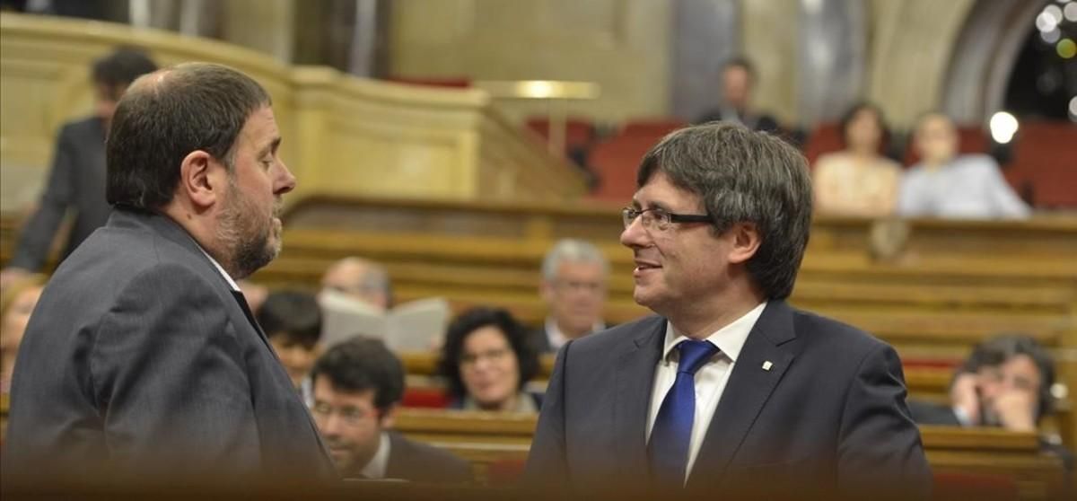 Carles Puigdemont i Oriol Junqueras. Carles Puigdemont i Oriol Junqueras.