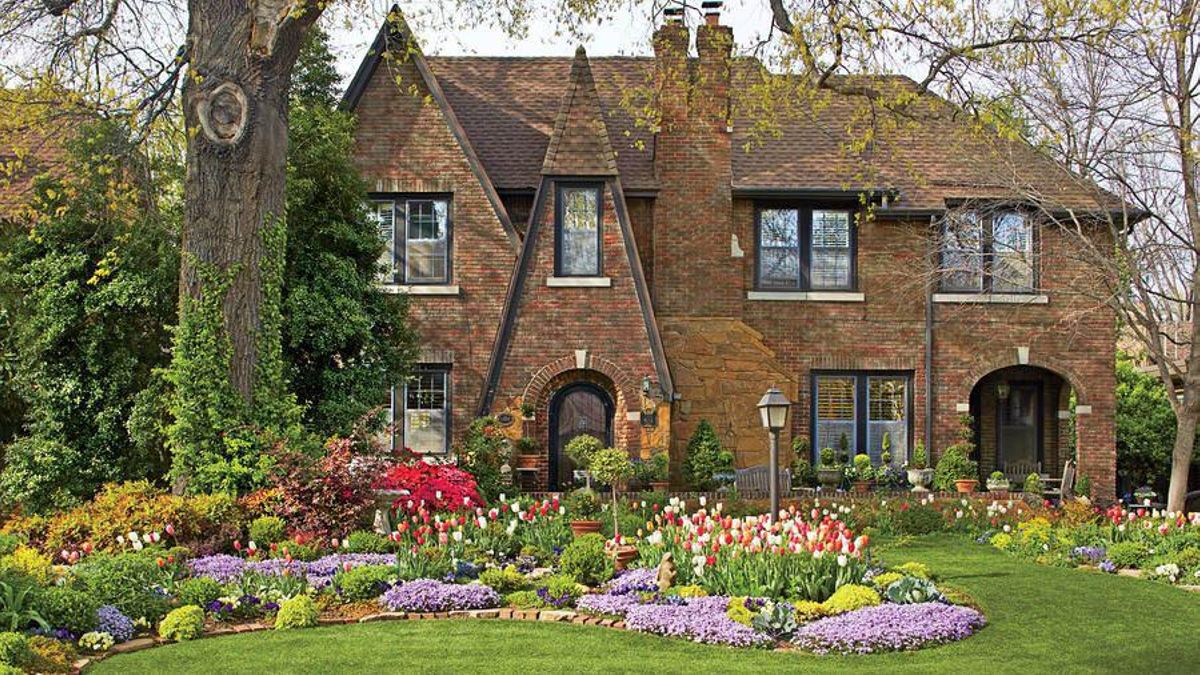 Casa de campo inglesa con su jardín. Casa de campo inglesa con su jardín.
