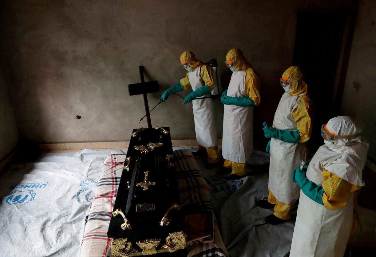 A healthcare worker sprays a room during a funeral of a person who is suspected of dying of Ebola in Beni North Kivu Province of Democratic Republic of Congo REUTERS Goran Tomasevic File Photo A healthcare worker sprays a room during a funeral of a person who is suspected of dying of Ebola in Beni North Kivu Province of Democratic Republic of Congo REUTERS Goran Tomasevic File Photo