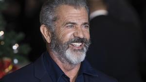 FILE - In this Nov  16  2017 file photo  Mel Gibson arrives at the premiere of  Daddys Home 2   in London  Gibson will co-write and direct a remake of Sam Peckinpaha  s classic Western a  The Wild Bunch a   Warner Bros  on Monday confirmed that Gibson will helm the production  with Bryan Bagby to co-write the script with him  It will be Gibsona  s first time directing since his 2016 World War II drama a  Hacksaw Ridge a   for which Gibson earned a best directing Oscar nomination   Photo by Vianney Le Caer Invision AP  File