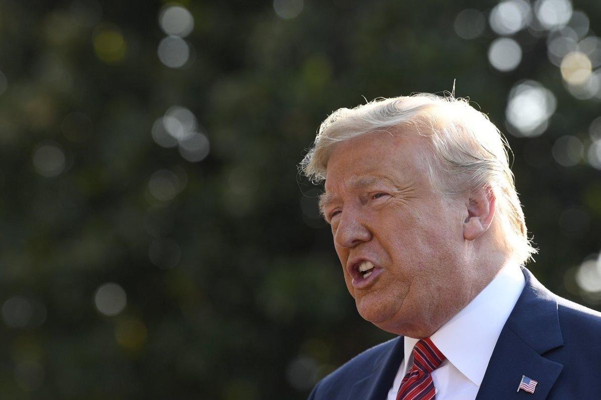 President Donald Trump talks with reporters on the South Lawn of the White House in Washington, Sunday, Sept. 22, 2019, as he prepares to board Marine One for the short trip to Andrews Air Force Base. Trump is traveling to Texas and Ohio before heading to New York for the upcoming United Nations General assembly. (AP Photo/Susan Walsh) President Donald Trump talks with reporters on the South Lawn of the White House in Washington, Sunday, Sept. 22, 2019, as he prepares to board Marine One for the short trip to Andrews Air Force Base. Trump is traveling to Texas and Ohio before heading to New York for the upcoming United Nations General assembly. (AP Photo/Susan Walsh)