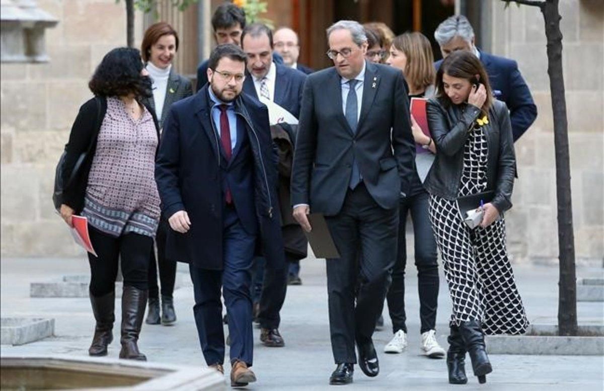 El ’president’ Quim Torra y el ’vicepresident’ Pere Aragonès llegan a la mesa de partidos catalanes. El ’president’ Quim Torra y el ’vicepresident’ Pere Aragonès llegan a la mesa de partidos catalanes.