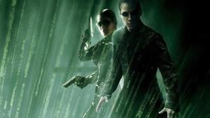 Keanu Reeves y Carrie-Anne Moss, en una imagen promocional de la trilogía original de ’Matrix’