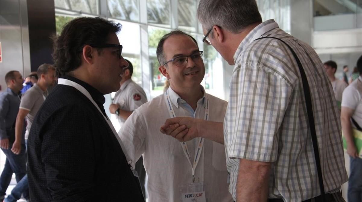 El dirigente convergente Jordi Turull conversa con militantes, en el congreso fundacional del nuevo partido, este sábado, 9 de juliol. El dirigente convergente Jordi Turull conversa con militantes, en el congreso fundacional del nuevo partido, este sábado, 9 de juliol.