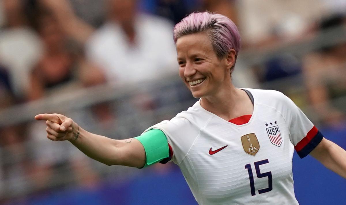 United States’ forward Megan Rapinoe celebrates after scoring a goal during the France 2019 Women’s World Cup round of sixteen football match between Spain and USA, on June 24, 2019, at the Auguste-Delaune stadium in Reims, northern France. (Photo by Lionel BONAVENTURE / AFP)
