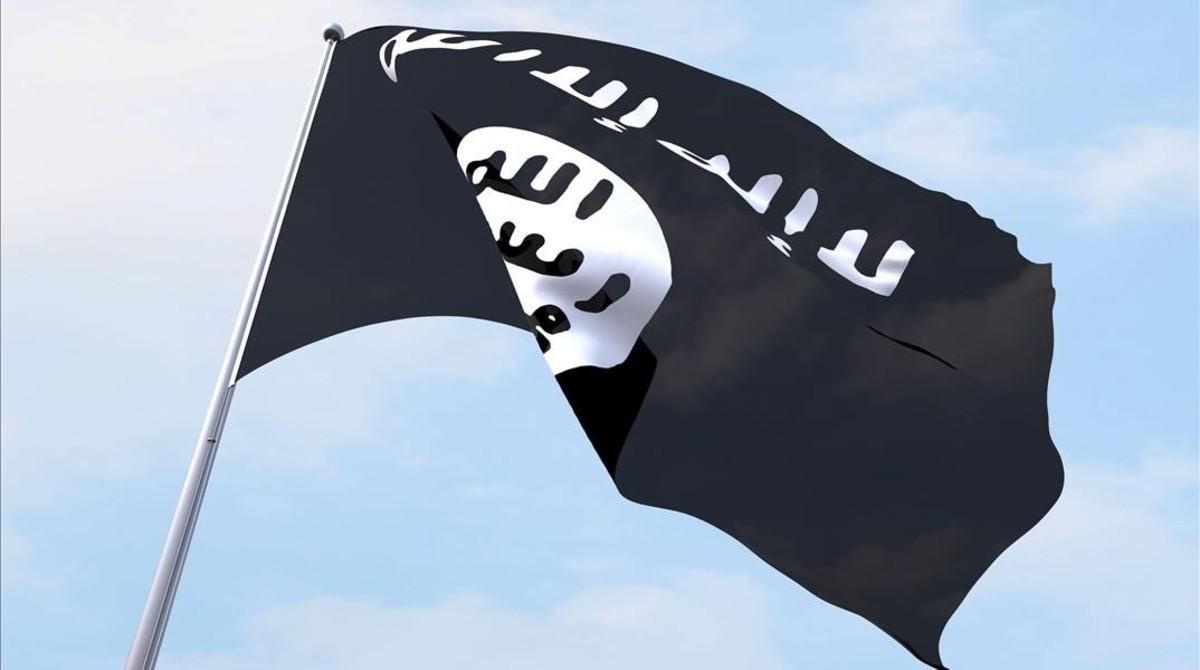 Una bandera del Estado Islámico ondeando. Una bandera del Estado Islámico ondeando.