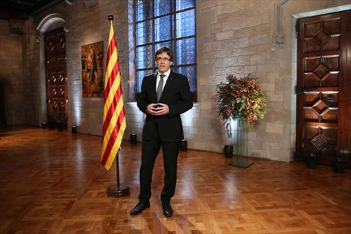 Puigdemont, durante el discurso de Fin de Año en la Generalitat. Puigdemont, durante el discurso de Fin de Año en la Generalitat.