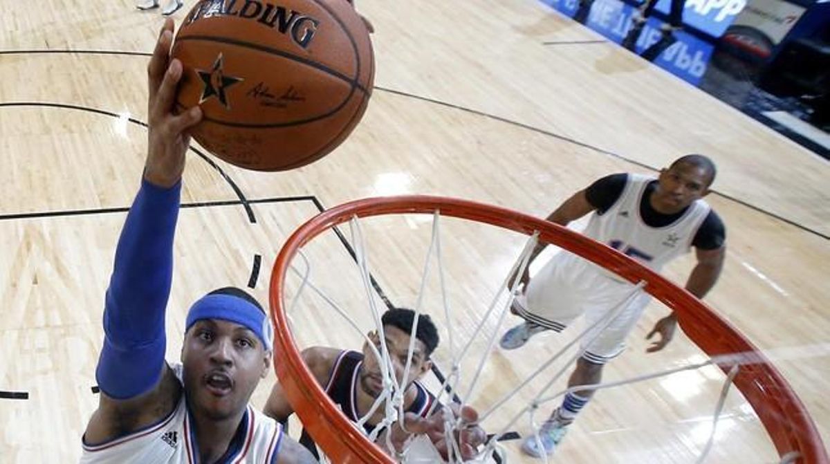 Carmelo Anthony entra a canasta durante el Partido de las Estrellas en el Madison Square Garden. Carmelo Anthony entra a canasta durante el Partido de las Estrellas en el Madison Square Garden.