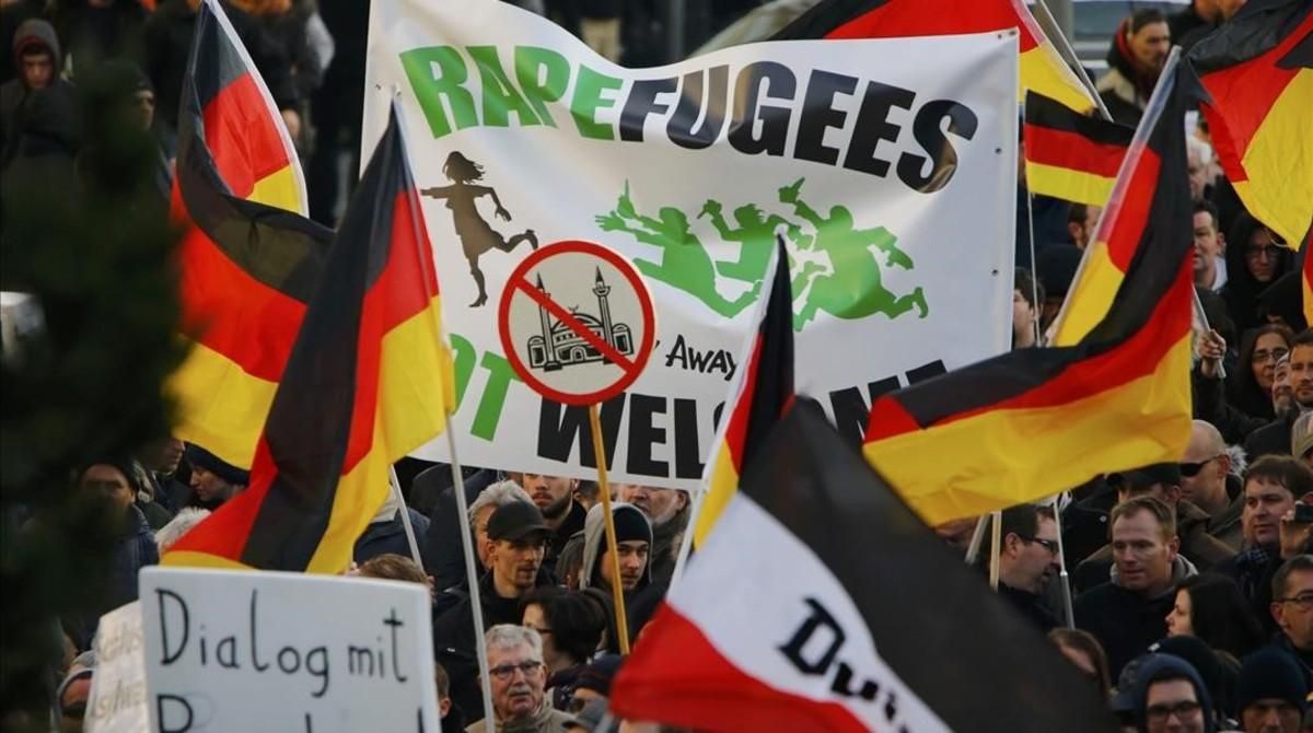 Manifestantes del movimiento antiinmigración Pegida. Manifestantes del movimiento antiinmigración Pegida.