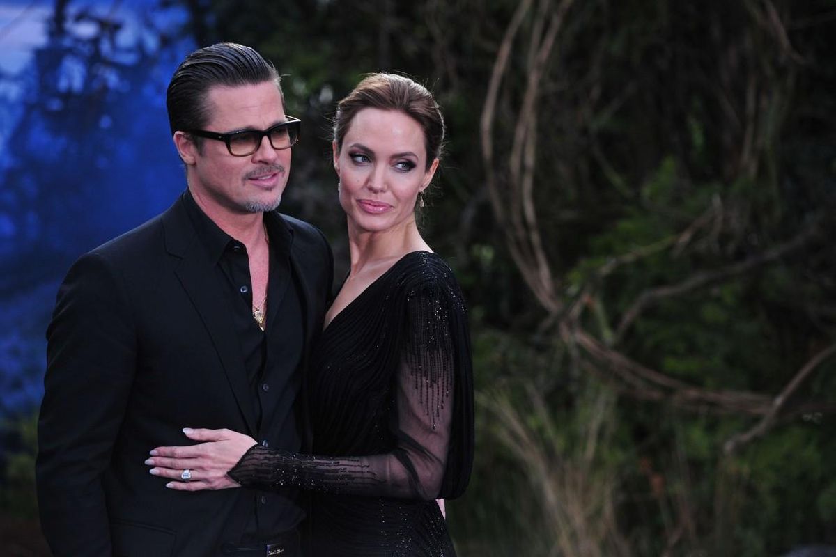 Angelina Jolie y Brad Pitt, en mayo del 2014, en Los Ángeles. Angelina Jolie y Brad Pitt, en mayo del 2014, en Los Ángeles.
