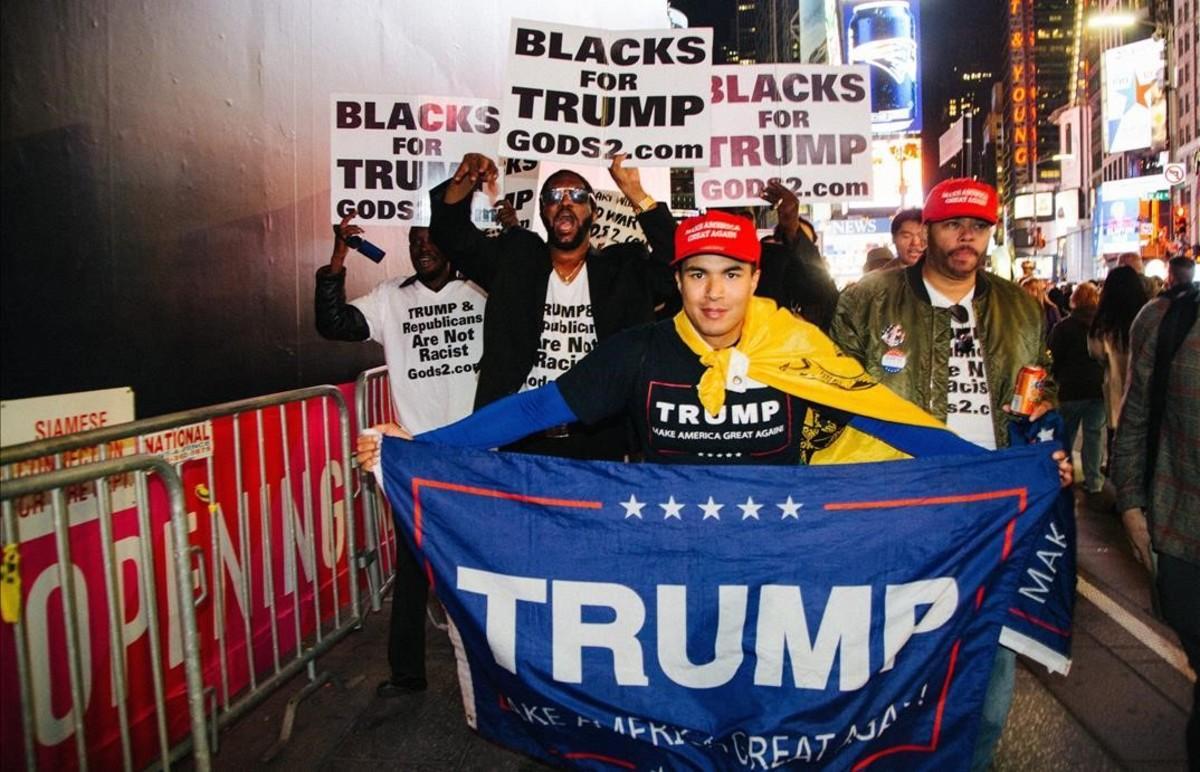 Seguidores de Donald Trump en el Times Square de Nueva York. Seguidores de Donald Trump en el Times Square de Nueva York.