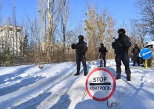 Militares participan en unos ejercicios tácticos y especiales conjuntos del Ministerio del Interior de Ucrania, la Guardia Nacional y el Ministerio de Emergencias en Pripyat.