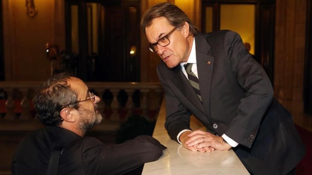 Antonio Baños y Artur Mas en el Parlament de Catalunya.