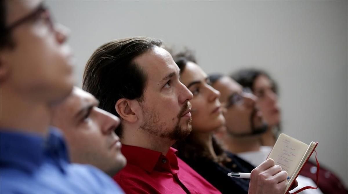 Errejón, Alegre, Iglesias y Pascual en una rueda de prensa, en enero de 2015. Errejón, Alegre, Iglesias y Pascual en una rueda de prensa, en enero de 2015.