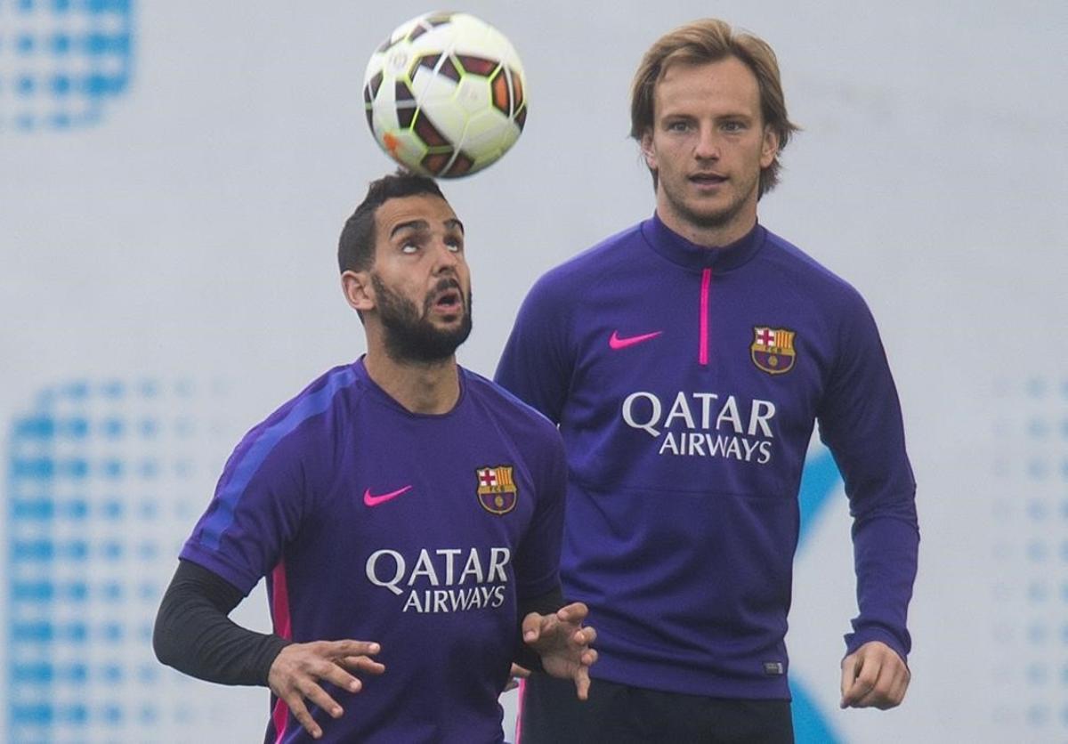 Montoya y Rakitic, en un entrenamiento del Barça de la pasada campaña.