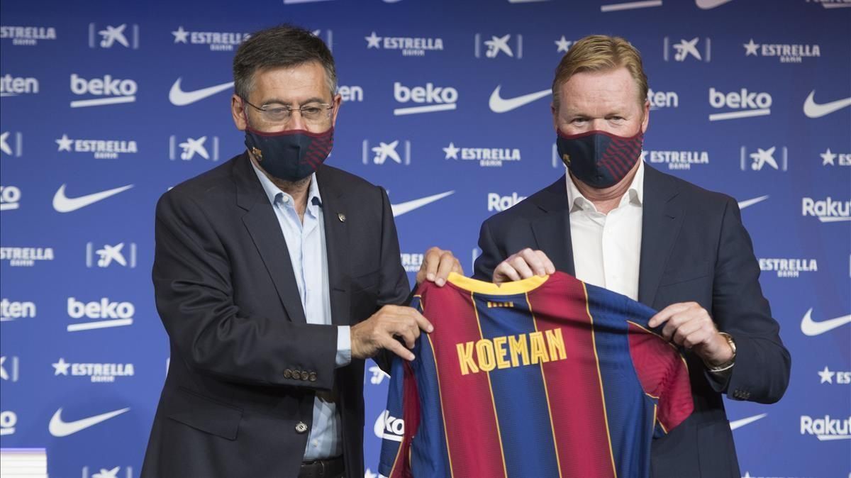 Ronald Koeman junto al presidente del FC Barcelona Josep Maria Bartomeu presentado como entrenador de la primera plantilla del Barca para las dos proximas temporadas Ronald Koeman junto al presidente del FC Barcelona Josep Maria Bartomeu presentado como entrenador de la primera plantilla del Barca para las dos proximas temporadas