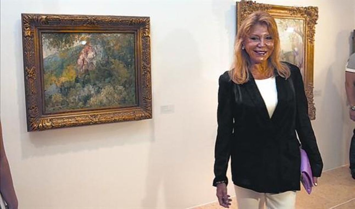 Paisajes 8Carmen Cervera, ayer, ante la obra de Meifrèn ’Valldemosa’, en la nueva muestra de Sant Feliu. Paisajes 8Carmen Cervera, ayer, ante la obra de Meifrèn ’Valldemosa’, en la nueva muestra de Sant Feliu.