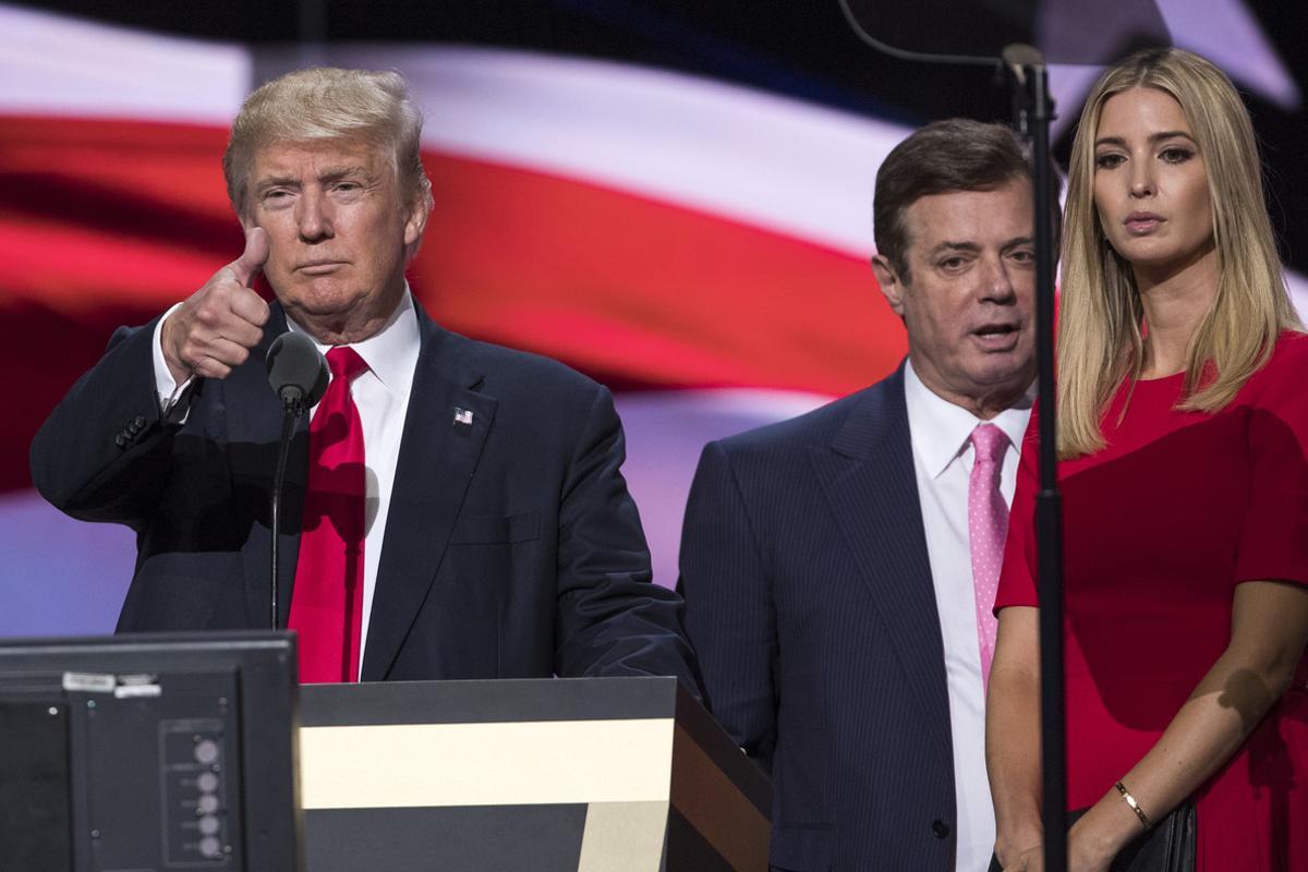 FILE - In this July 21, 2016 file photo, then-Trump Campaign manager Paul Manafort stands between the then-Republican presidential candidate Donald Trump and his daughter Ivanka Trump during a walk through at the Republican National Convention in Cleveland. Oleg Deripaska, a Russian billionaire close to President Vladimir Putin says he is willing to take part in U.S. congressional hearings to discuss his relationship with President Donald Trumpâ¿¿s former campaign chairman, Paul Manafort.  (AP Photo/Evan Vucci, File)