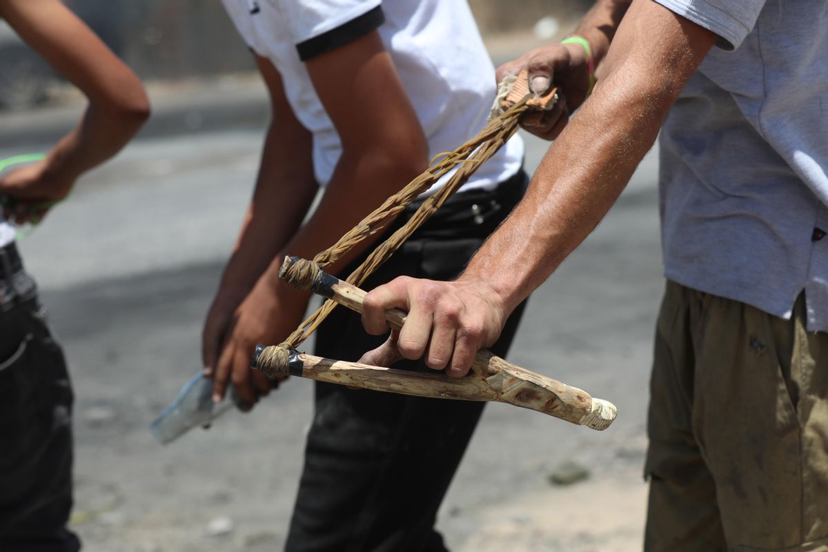 Unos manifestantes palestinos en Cisjordania. Unos manifestantes palestinos en Cisjordania.