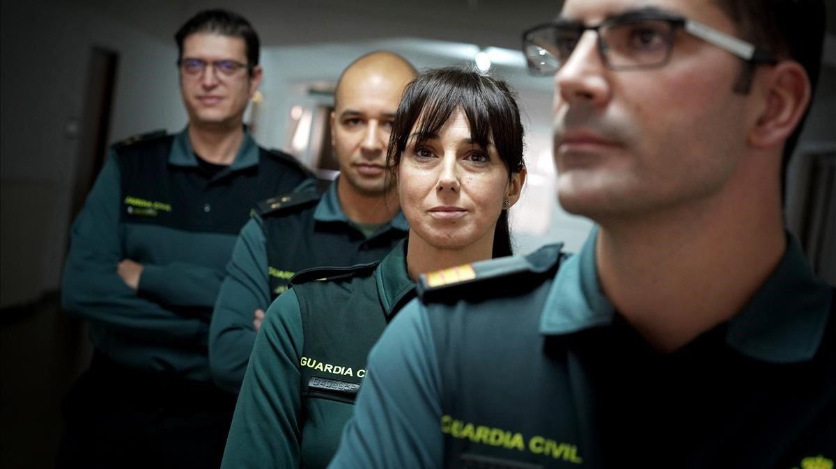 Cuatro de los cinco integrantes del Servicio de Análisis del Comportamiento Delictivo de la Guardia Civil. De izquierda a derecha, el capitán Sotoca, el capitán Touza, la guardia Medina y el sargento Ramos.