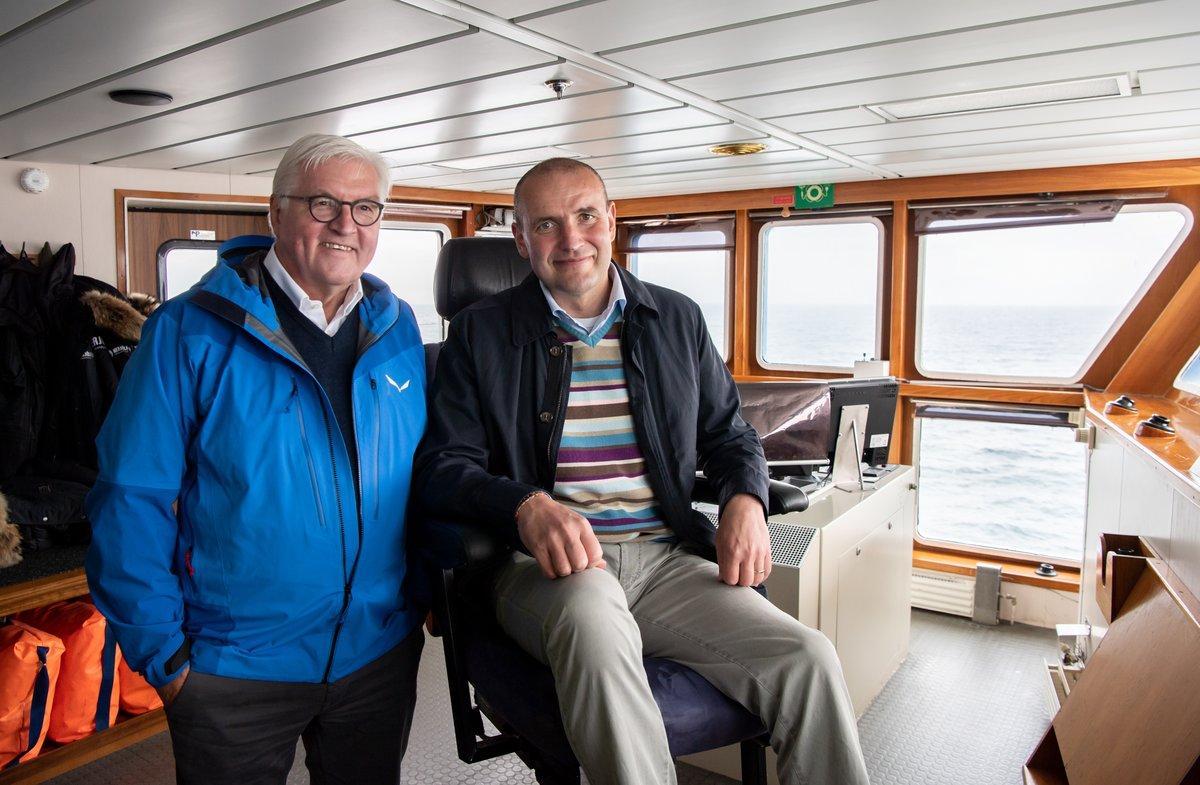 13/06/2019 13 June 2019, Iceland, Reykjavik: German President Frank-Walter Steinmeier (L) and Gudni Thorlacius Johannesson President of Iceland, take a ferry to Heimaey Island on the Westman Islands. Steinmeier and his wife are on a two-day state visit to Iceland. Photo: Bernd von Jutrczenka/dpa