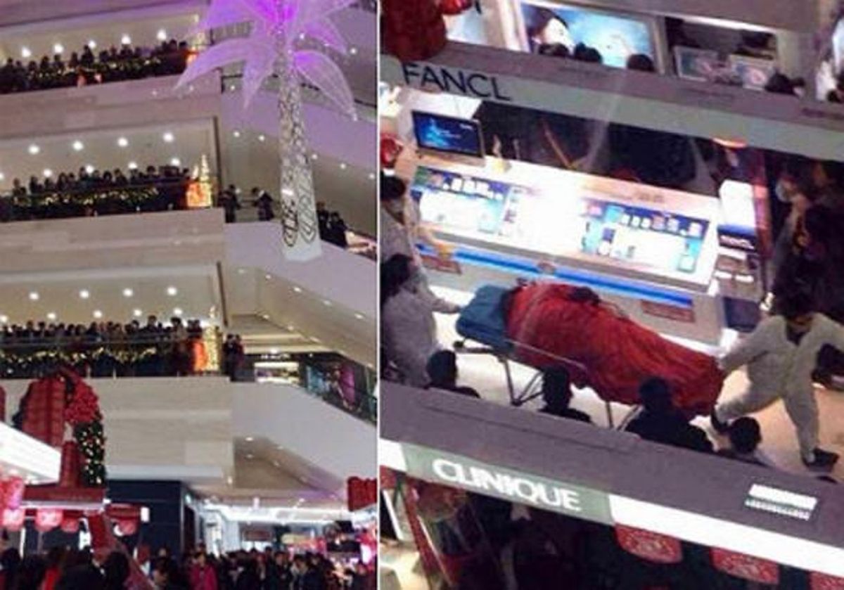 Aspecto del centro comercial Golden Eagle Internacional y del momento en que los camilleros se llevan el cuerpo de Tao Hsiao. Aspecto del centro comercial Golden Eagle Internacional y del momento en que los camilleros se llevan el cuerpo de Tao Hsiao.